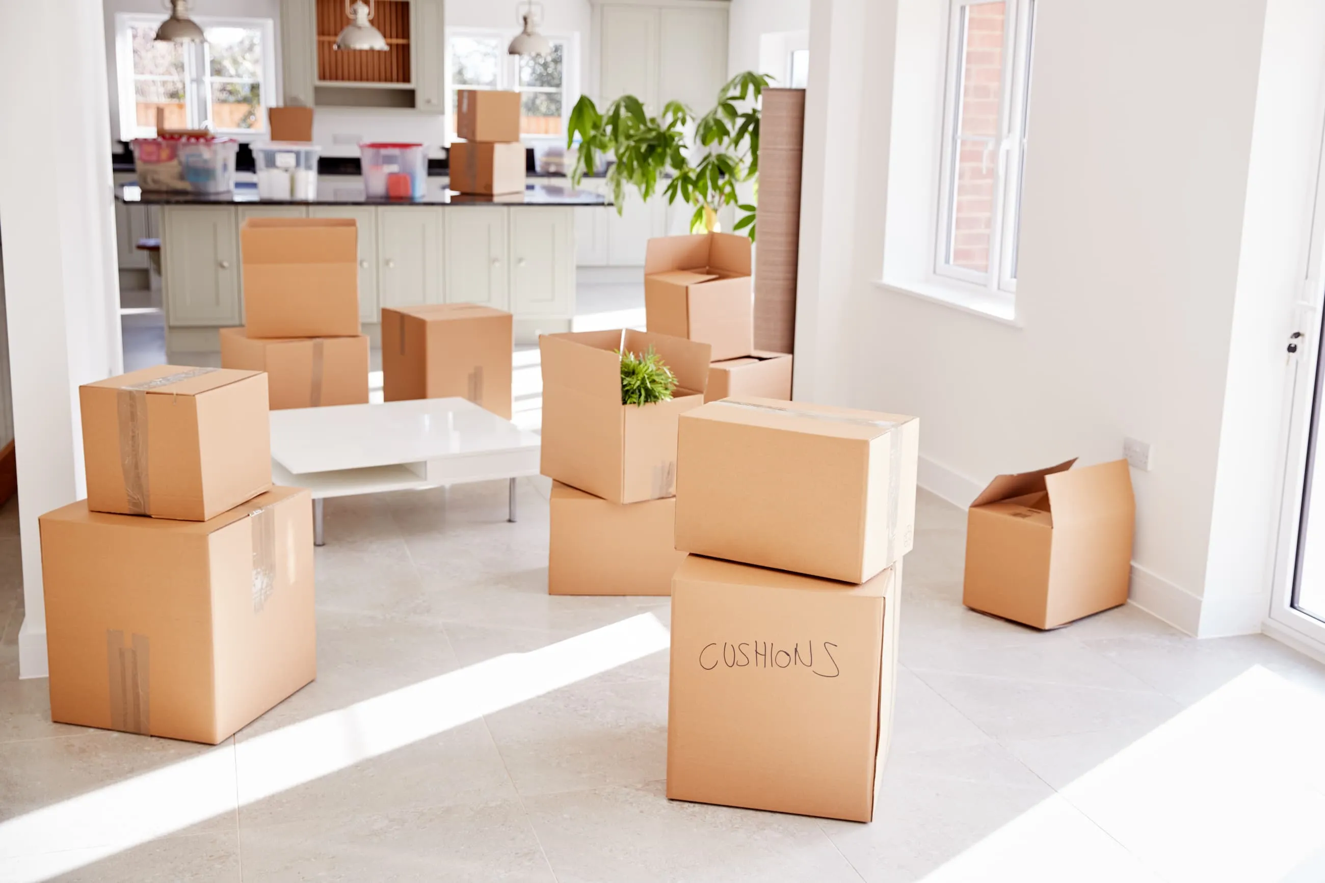 A stack of corrugated moving boxes.